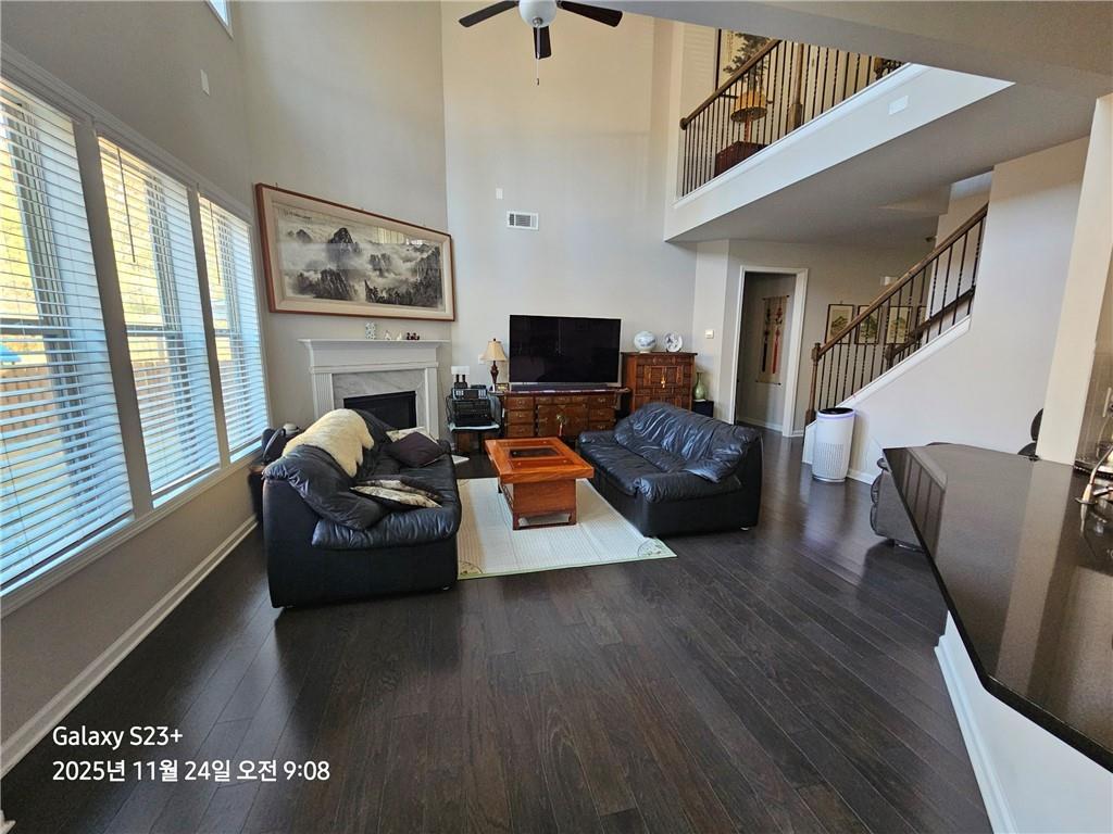 1909 Lakeview Bend Way Buford, GA 30519 - Photo 11 of 30 a living room with furniture and a flat screen tv