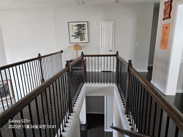 a view of entryway with wooden floor