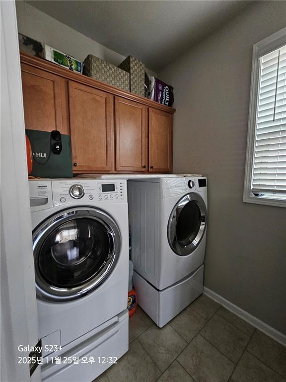 1909 Lakeview Bend Way Buford, GA 30519 - Photo 30 of 30 a utility room with dryer and washer