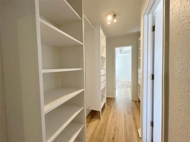 a view of a bathroom with a glass door