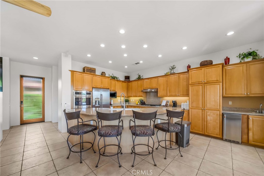 80305 Cedar Crest La Quinta, CA 92253 - Photo 13 of 26 a view of a dining room with furniture