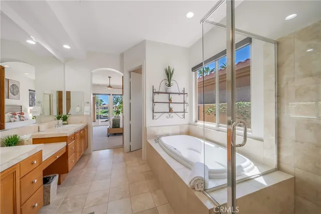 a bedroom with bed and window