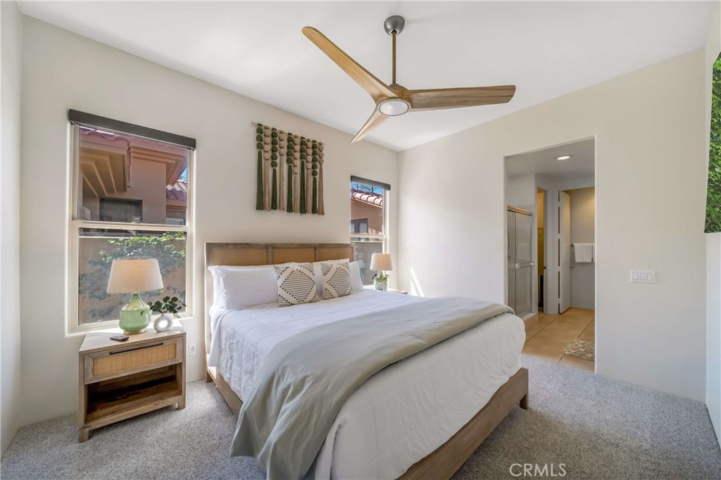 80305 Cedar Crest La Quinta, CA 92253 - Photo 24 of 26 a bedroom with bed and window