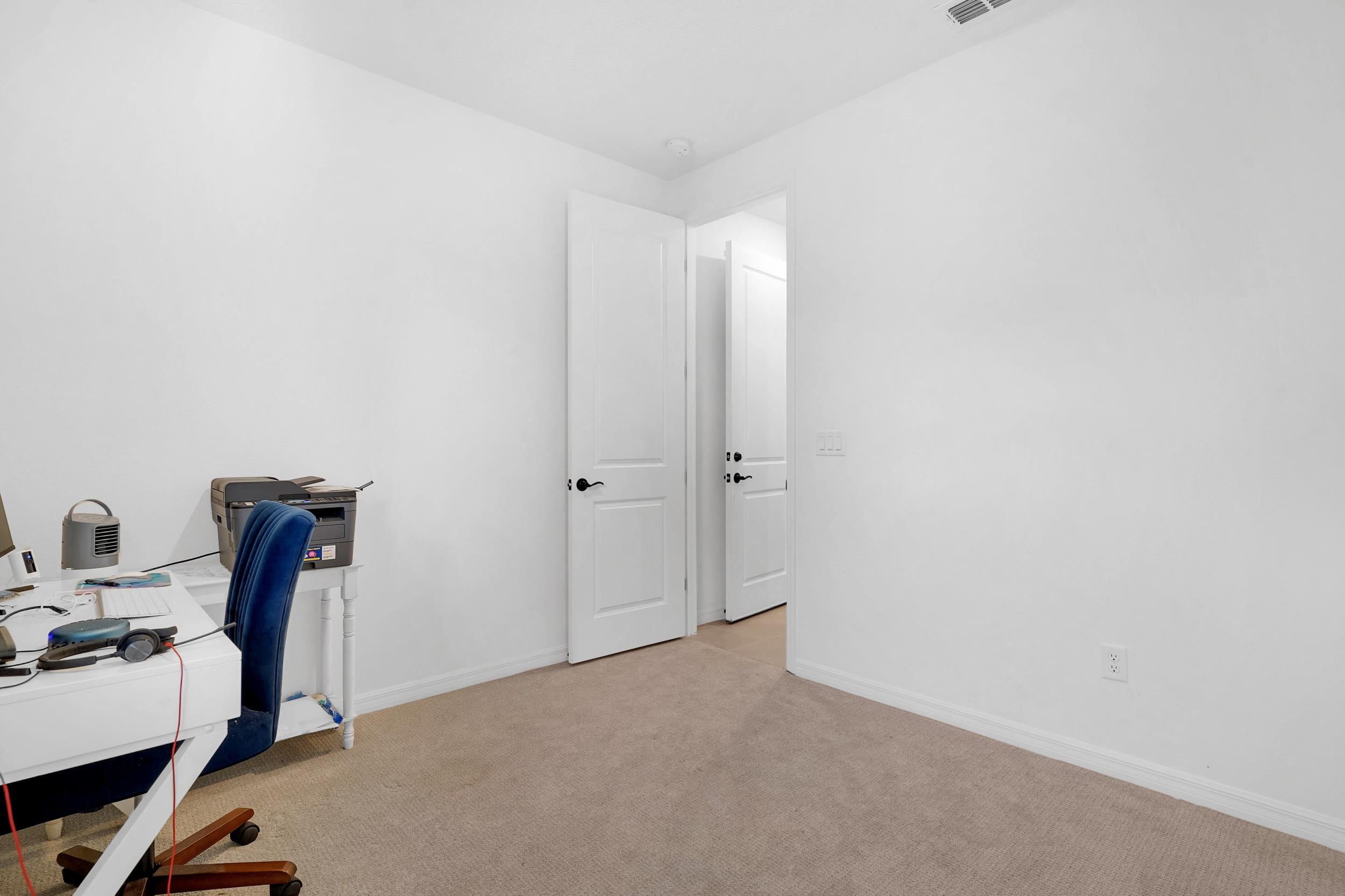 127 Shell Crk Court St. Augustine, FL 32086 - Photo 16 of 38 a view of a workspace with furniture and a window