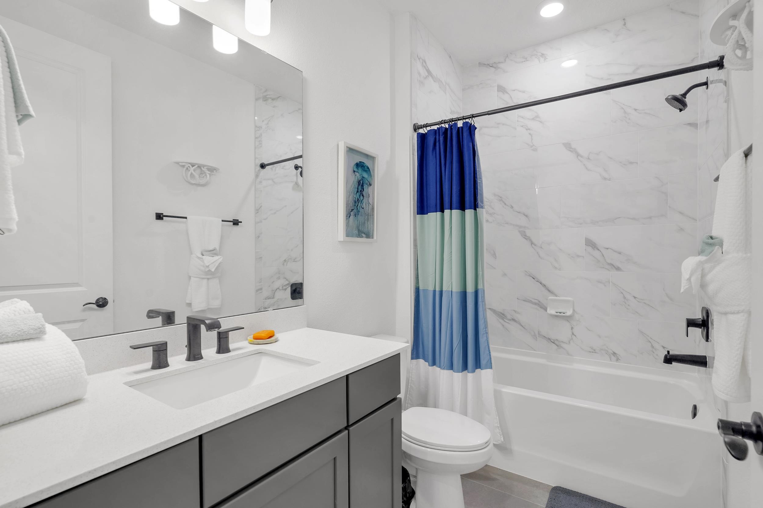 127 Shell Crk Court St. Augustine, FL 32086 - Photo 25 of 38 a bathroom with a sink toilet tub and shower