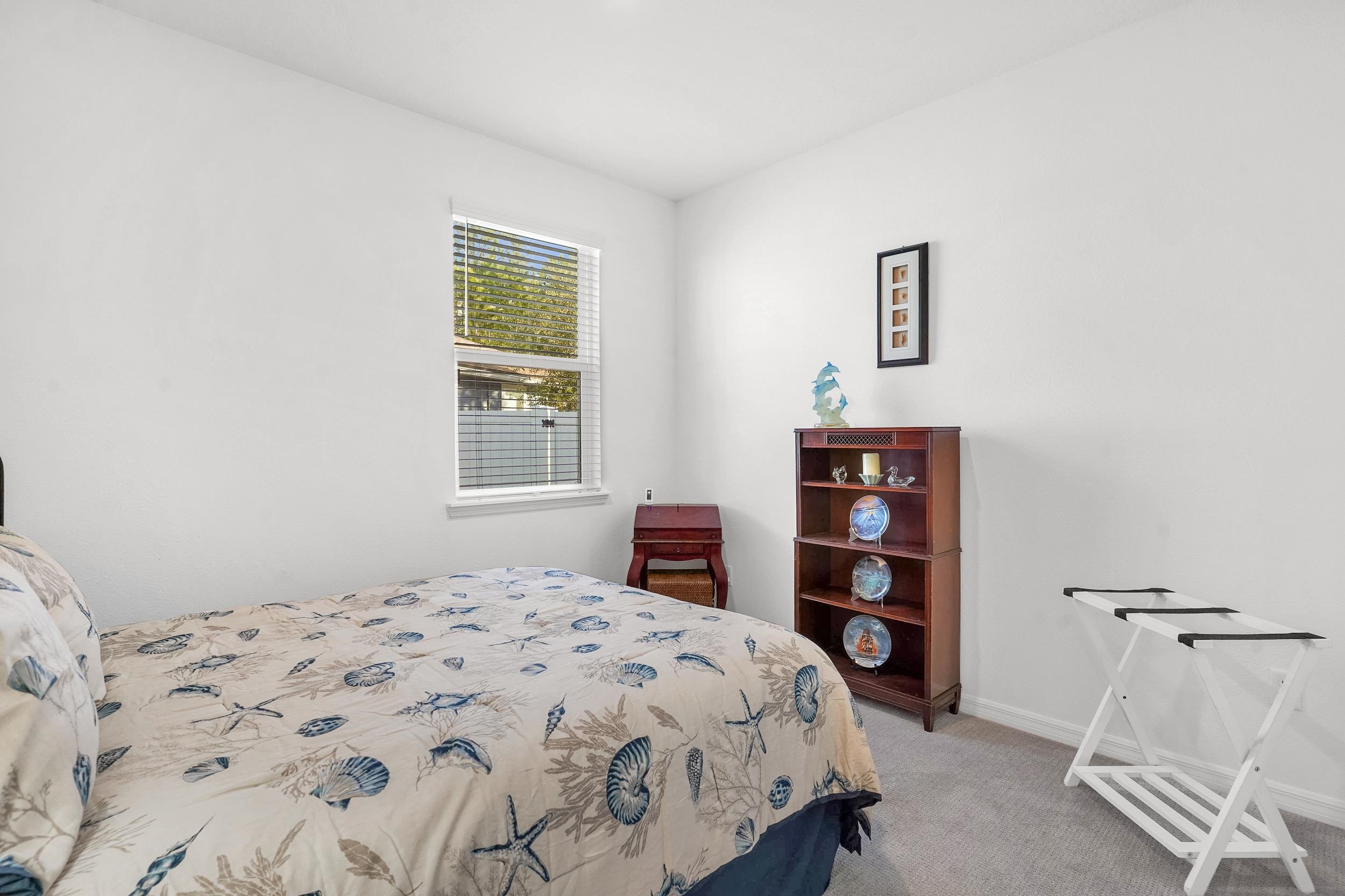 127 Shell Crk Court St. Augustine, FL 32086 - Photo 26 of 38 a bedroom with a bed and a window