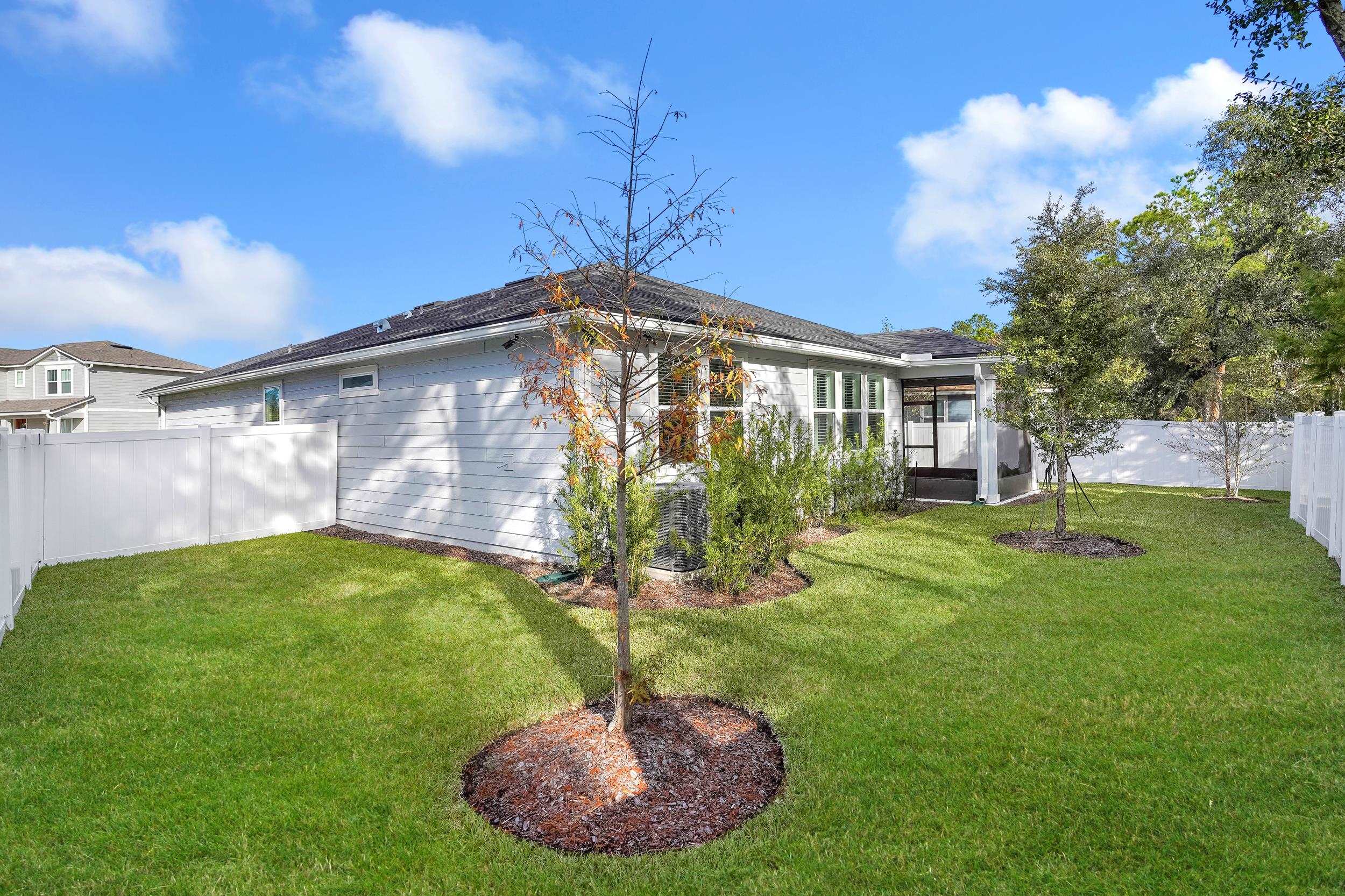 127 Shell Crk Court St. Augustine, FL 32086 - Photo 5 of 38 a house view with a garden space