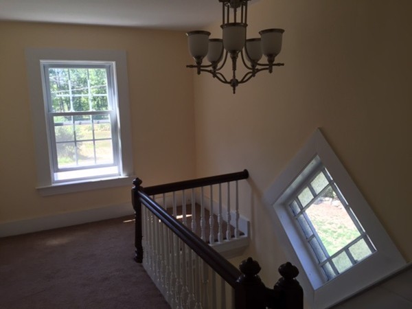 25 Walnut Hill Road Sandown, NH 03873 - Photo 11 of 29 a view of hallway with windows