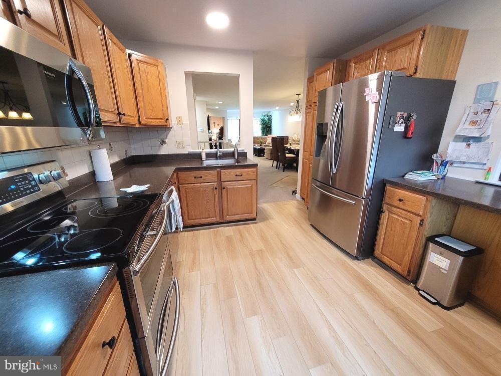 1201 Augusta Circle Mount Laurel, NJ 08054 - Photo 4 of 34 Kitchen with new luxury plank vinyl