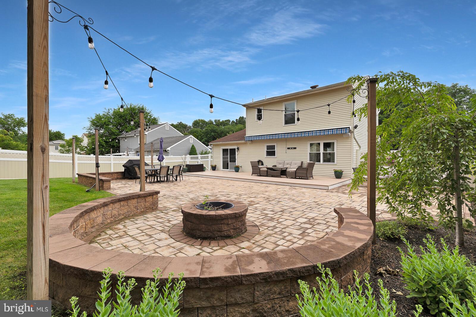 505 Buxton Road Toms River, NJ 08755 - Photo 27 of 31 Charming backyard retreat with fire pit.