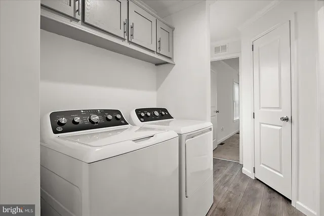 a view of residential houses with outdoor space and swimming pool