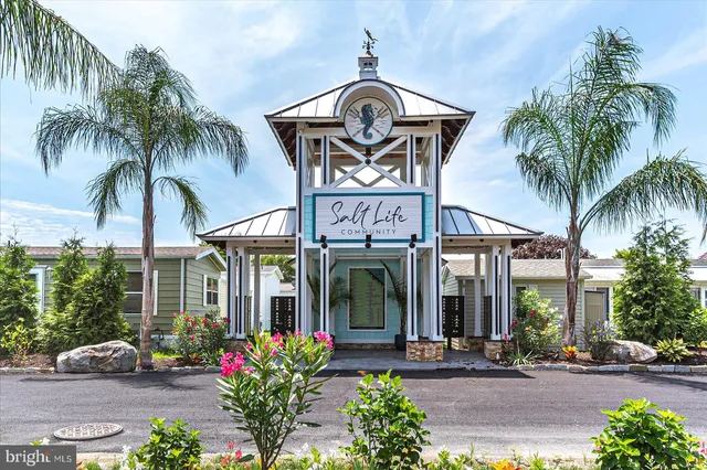 a front view of a building with garden