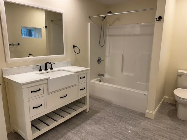 a side view of a house with a door