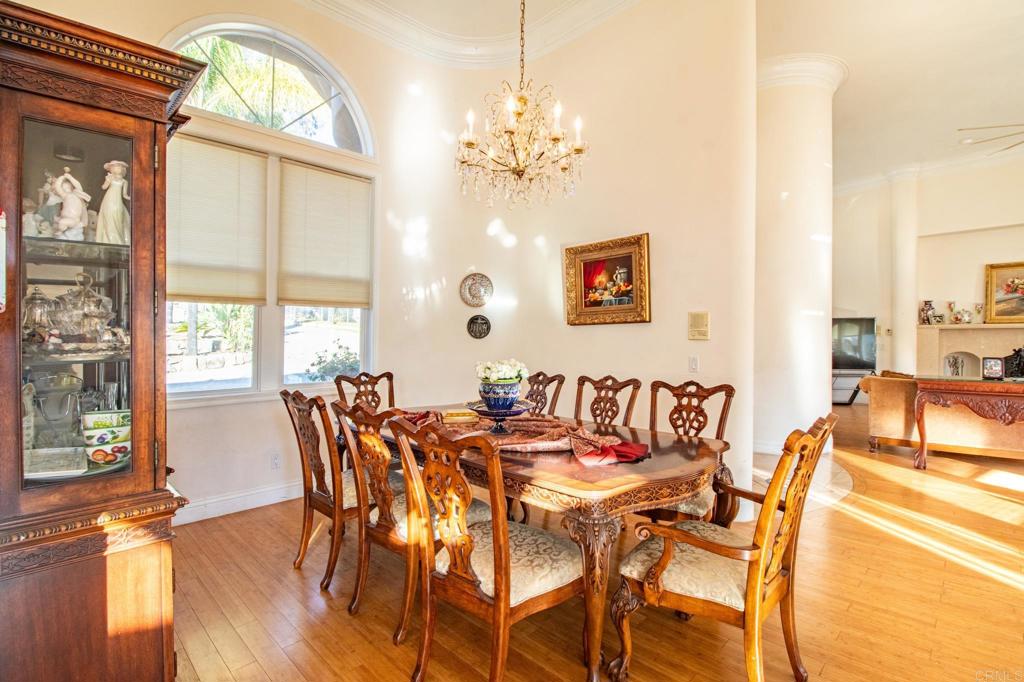2057 Via Rancho Parkway Escondido, CA 92029 - Photo 14 of 56 a view of a dining room with furniture window and wooden floor