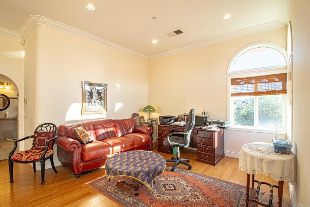 2057 Via Rancho Parkway Escondido, CA 92029 - Photo 27 of 56 a living room with furniture and a window