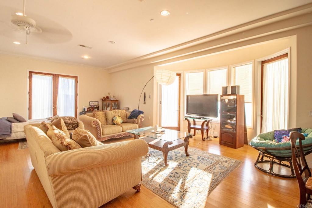 2057 Via Rancho Parkway Escondido, CA 92029 - Photo 28 of 56 a living room with furniture and a large window
