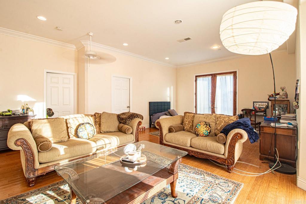 2057 Via Rancho Parkway Escondido, CA 92029 - Photo 29 of 56 a living room with furniture and a large window