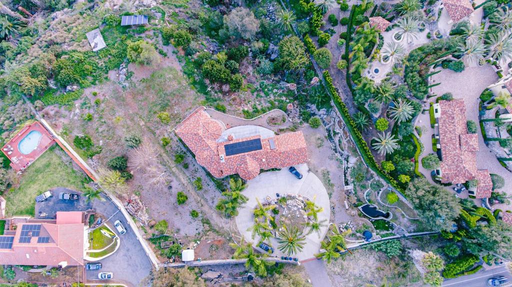 2057 Via Rancho Parkway Escondido, CA 92029 - Photo 53 of 56 an aerial view of a house with a yard and swimming pool