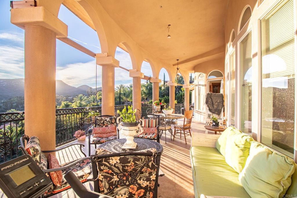 2057 Via Rancho Parkway Escondido, CA 92029 - Photo 8 of 56 a view of balcony with furniture and floor to ceiling windows