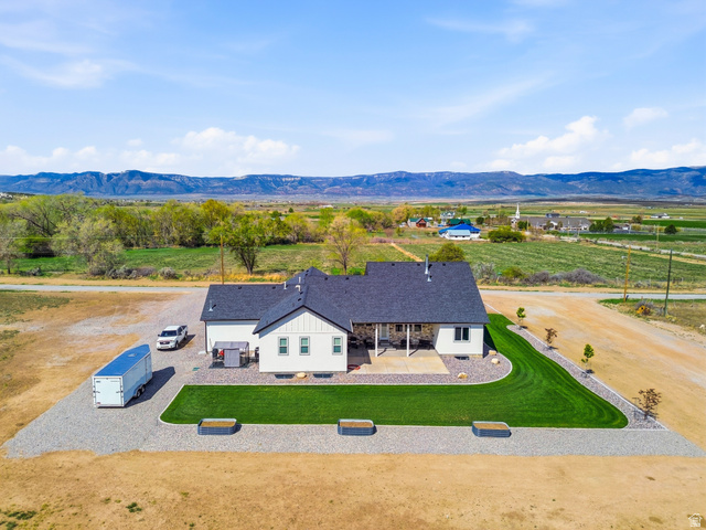 886 North 300th East Spring City, UT 84662 - Photo 4 of 40 View from above of property featuring a mountain backdrop