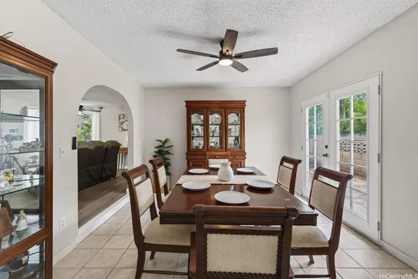 a view of a dining room with furniture and window