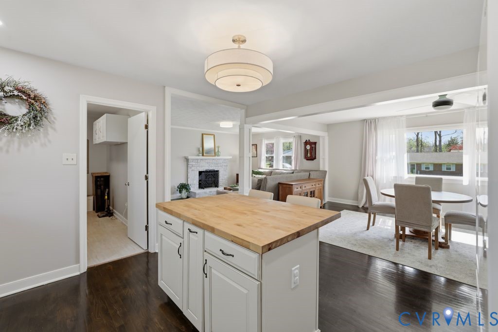 2831 Delfin Road Midlothian, VA 23112 - Photo 14 of 30 a view of a dining room with furniture window and wooden floor
