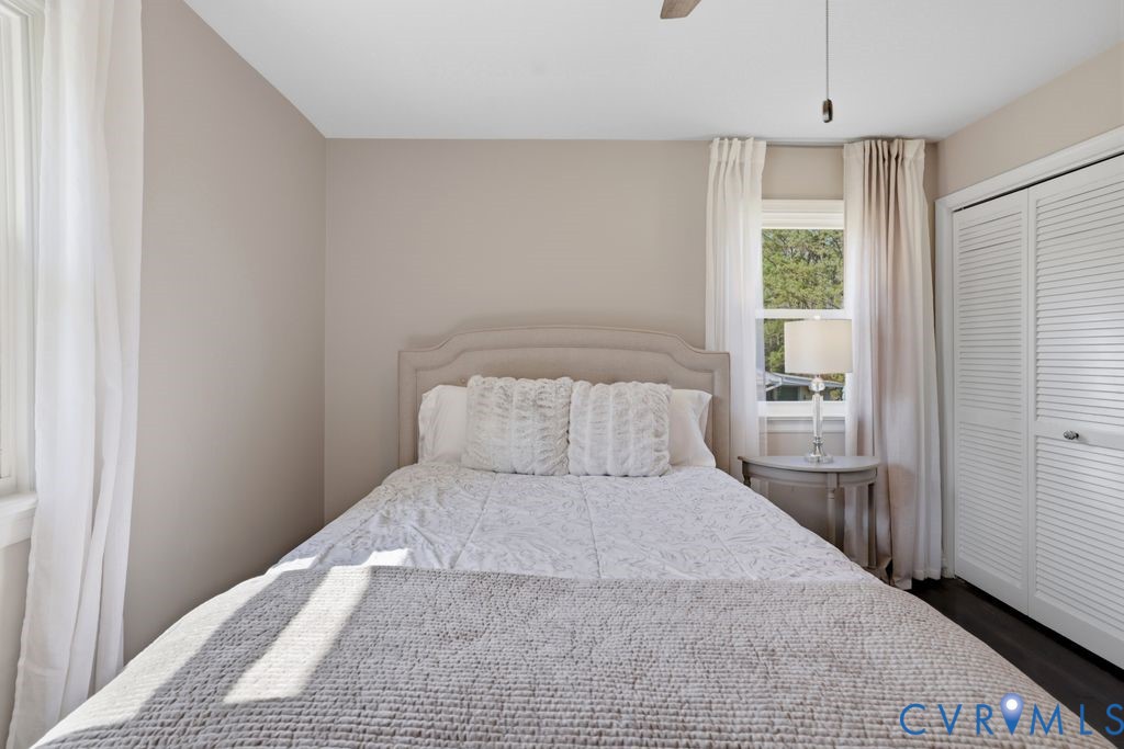 2831 Delfin Road Midlothian, VA 23112 - Photo 17 of 30 a bedroom with a large bed and a window