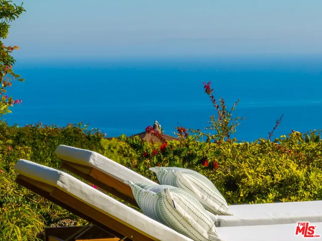 a view of an ocean from a balcony
