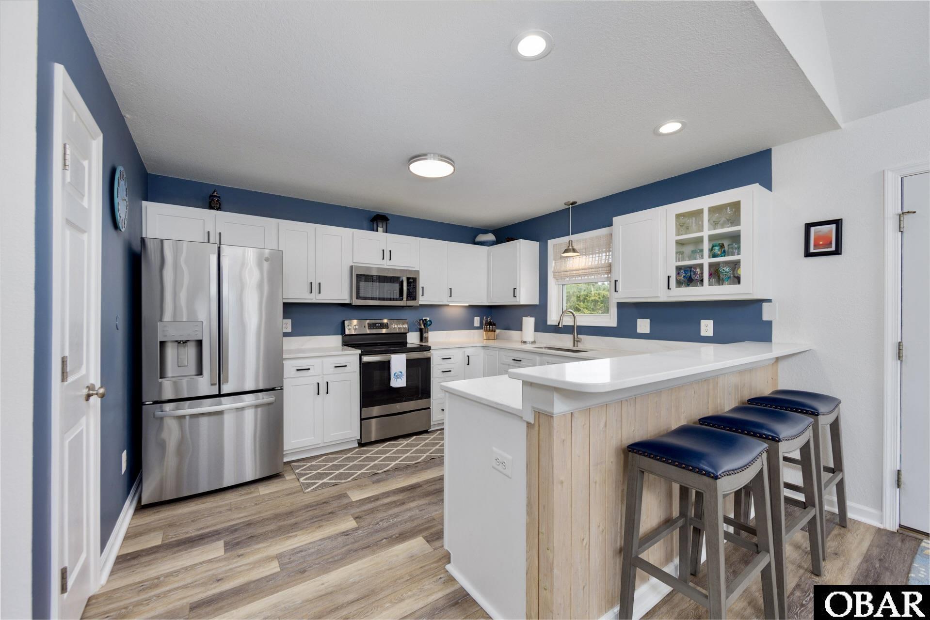 305 Oak Run, Unit 1 Kitty Hawk, NC 27949 - Photo 11 of 49 Timeless Style