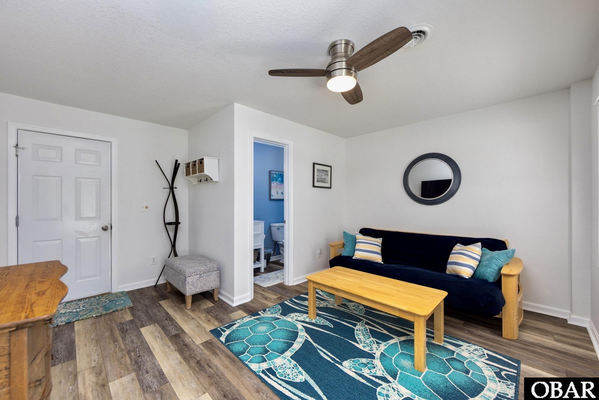 305 Oak Run, Unit 1 Kitty Hawk, NC 27949 - Photo 33 of 49 Poolside Lounge Room