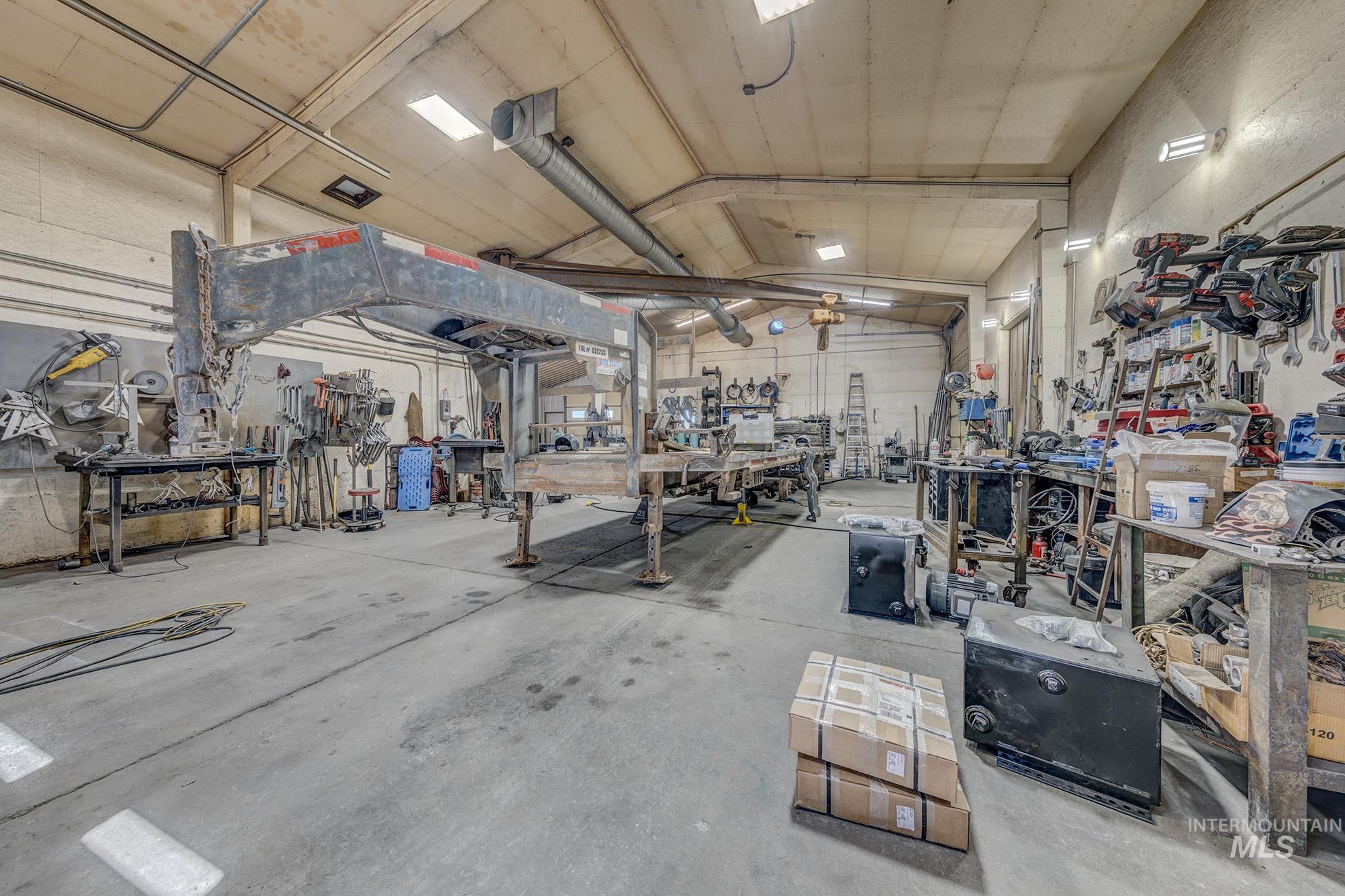 6040 Adams Road New Plymouth, ID 83655 - Photo 42 of 50 Garage with a workshop area