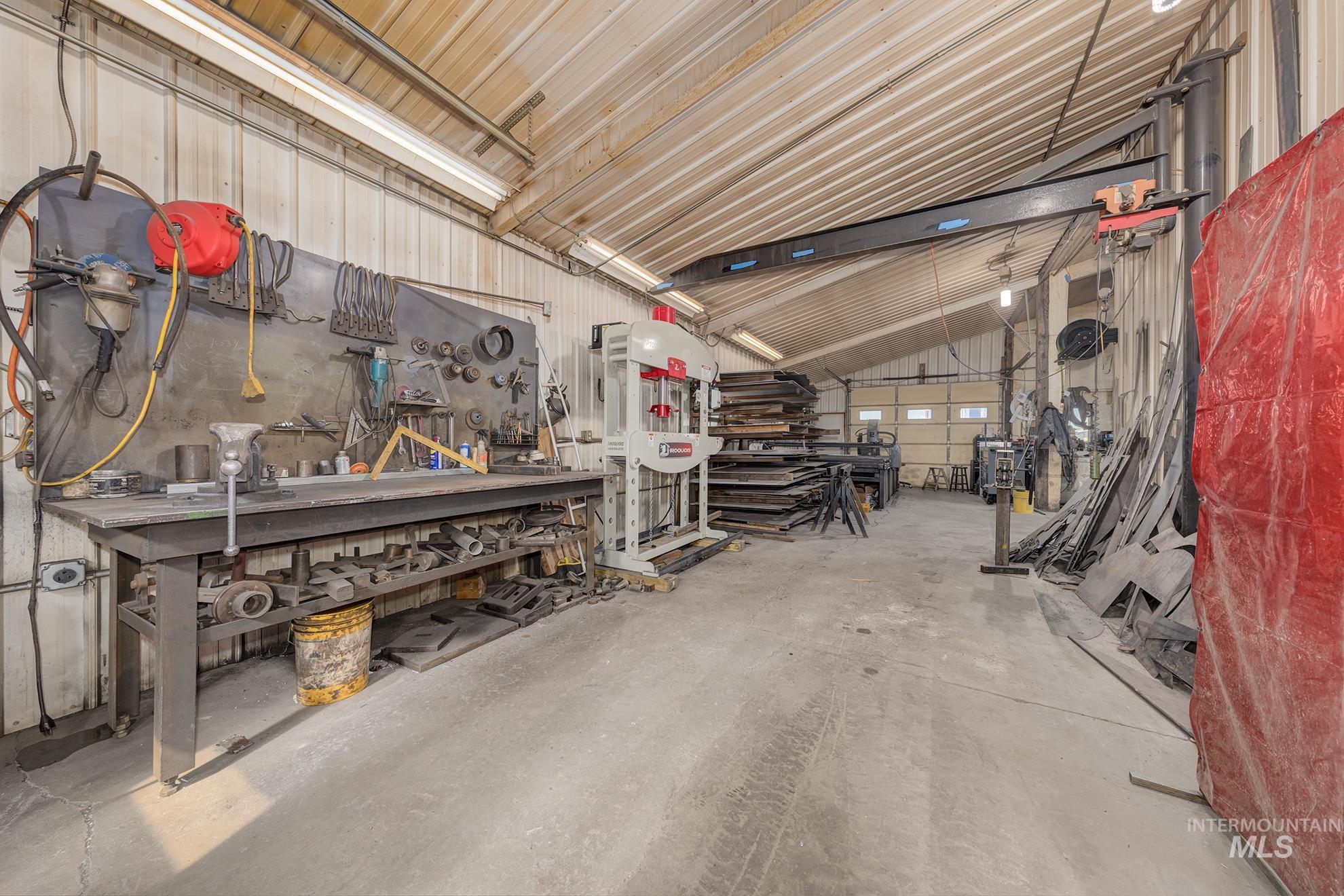 6040 Adams Road New Plymouth, ID 83655 - Photo 44 of 50 Garage with a workshop area