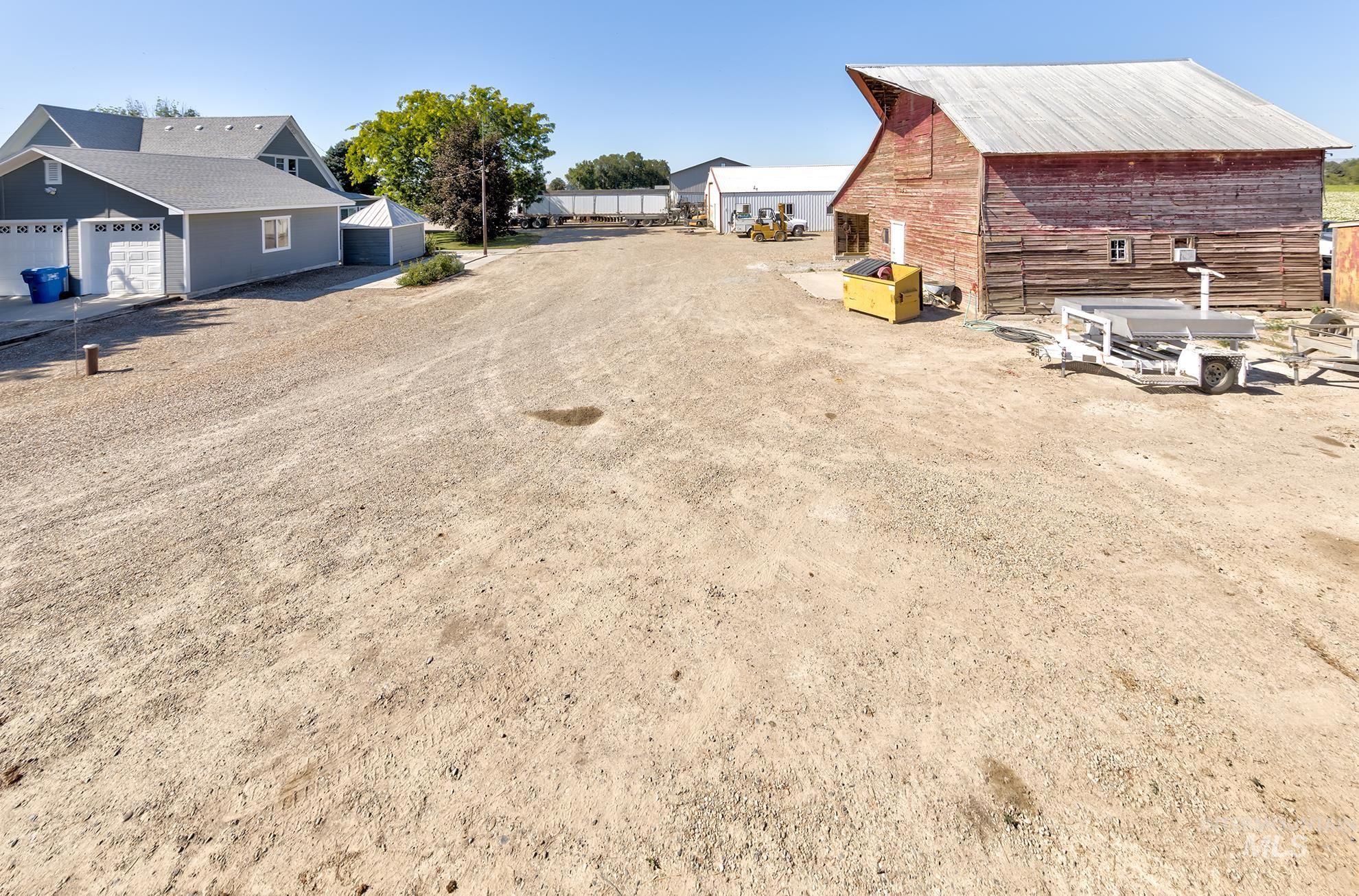 6040 Adams Road New Plymouth, ID 83655 - Photo 47 of 50 View of dirt / gravel road with a barn