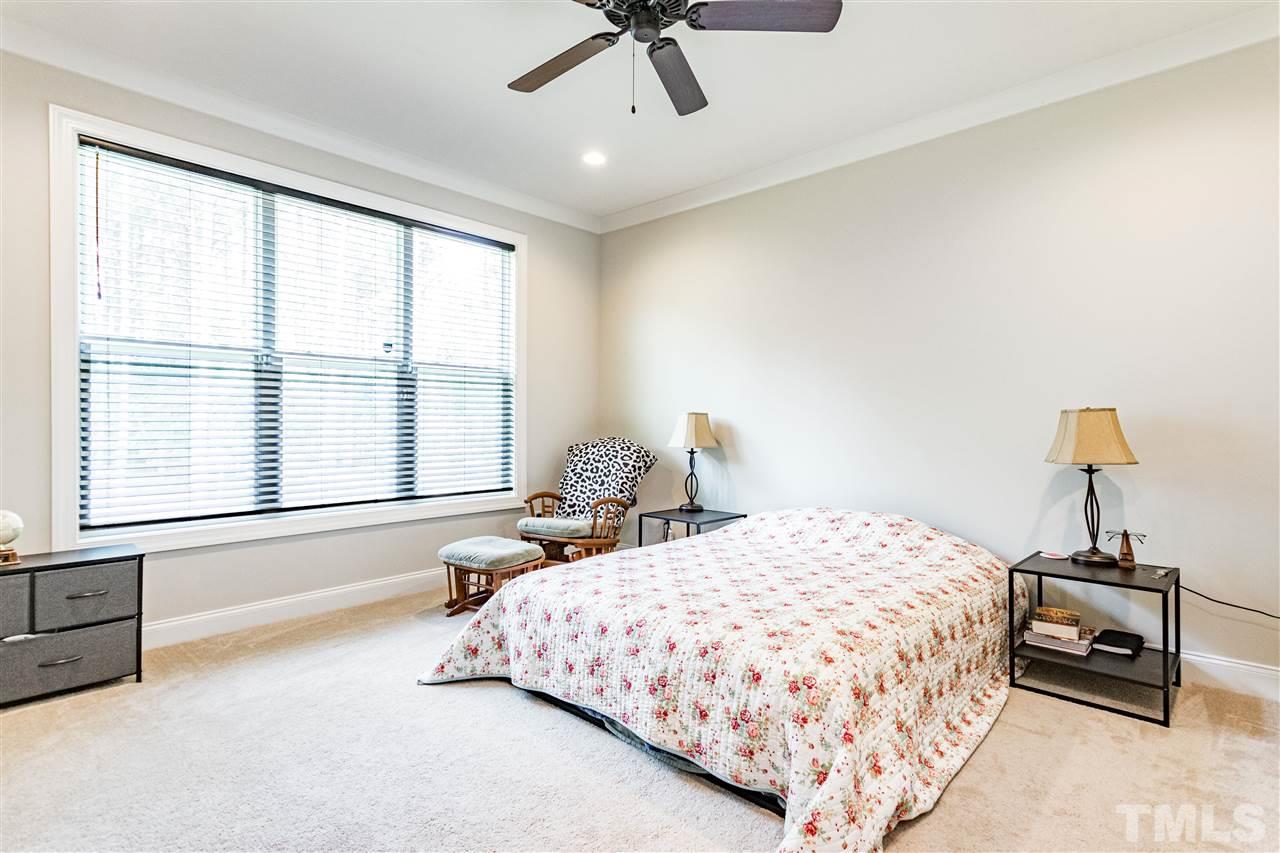 6401 Riley Hill Road Wendell, NC 27591 - Photo 18 of 23 a bedroom with a bed and a window