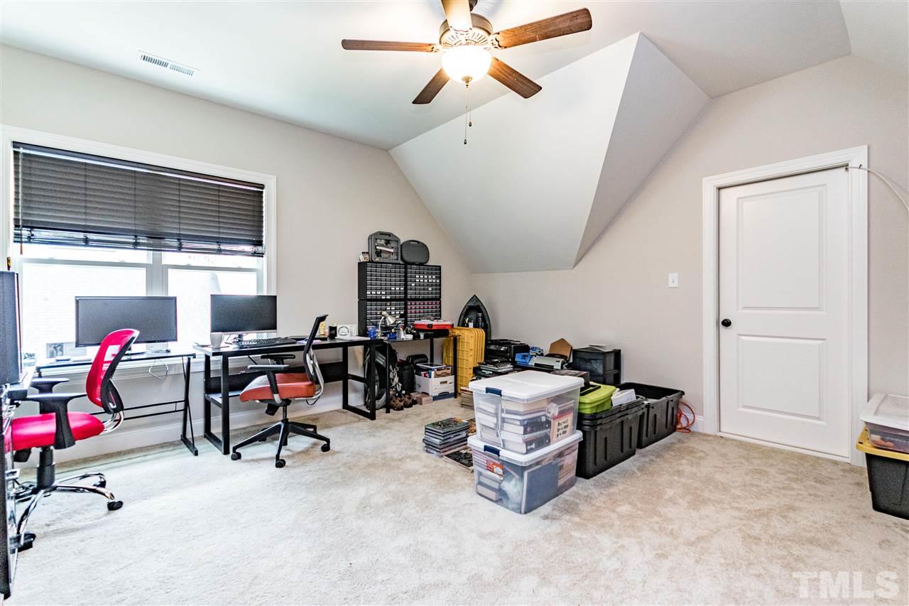 6401 Riley Hill Road Wendell, NC 27591 - Photo 22 of 23 a room with furniture and white walls