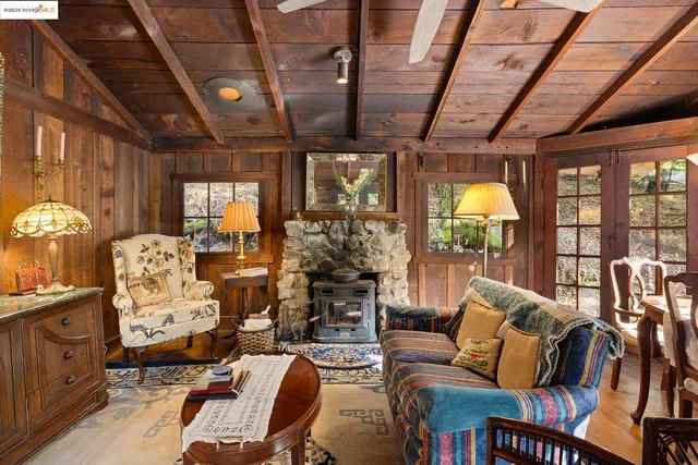a patio with table and chairs and couches