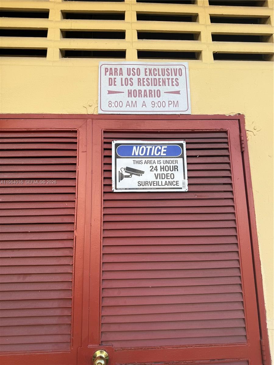 617 Southwest 11th Street, Unit 14E Miami, FL 33129 - Photo 13 of 16 a sign on a pole on a street