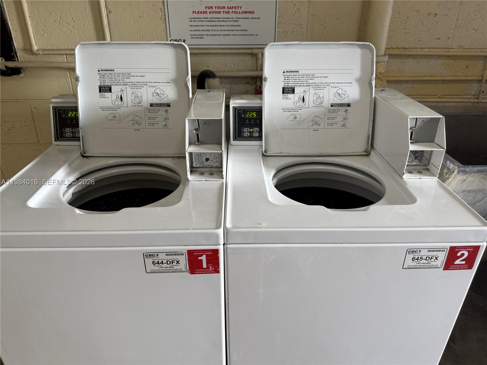 617 Southwest 11th Street, Unit 14E Miami, FL 33129 - Photo 14 of 16 a close up view of washer and dryer