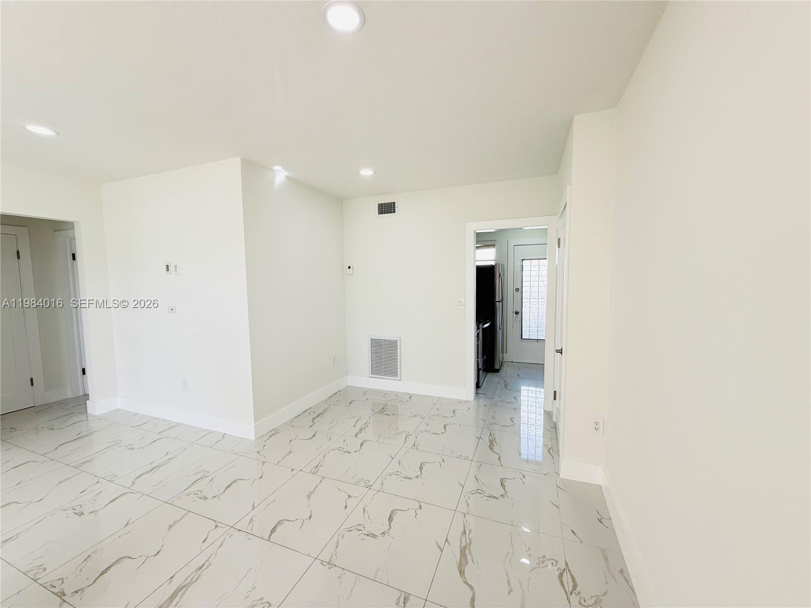 617 Southwest 11th Street, Unit 14E Miami, FL 33129 - Photo 4 of 16 a view of an empty room