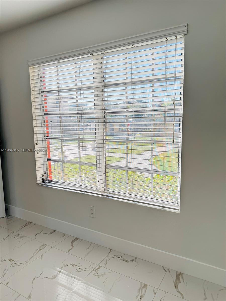 617 Southwest 11th Street, Unit 14E Miami, FL 33129 - Photo 5 of 16 a view of a window in a room