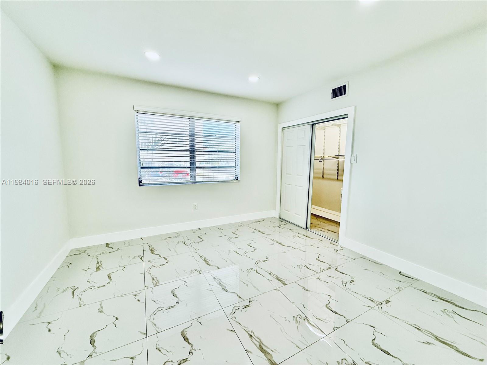 617 Southwest 11th Street, Unit 14E Miami, FL 33129 - Photo 10 of 16 a view of a room with window