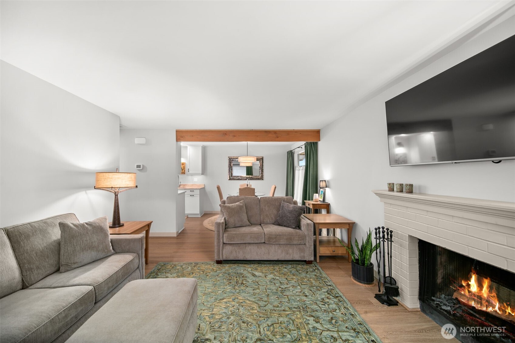 1535 Castlerock Avenue, Unit 26 Wenatchee, WA 98801 - Photo 2 of 32 a living room with furniture and a fireplace