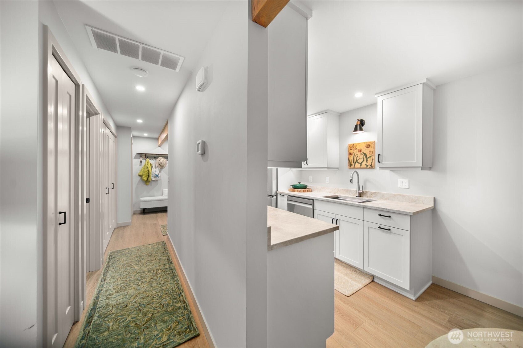 1535 Castlerock Avenue, Unit 26 Wenatchee, WA 98801 - Photo 24 of 32 a bathroom with a sink a mirror and a toilet