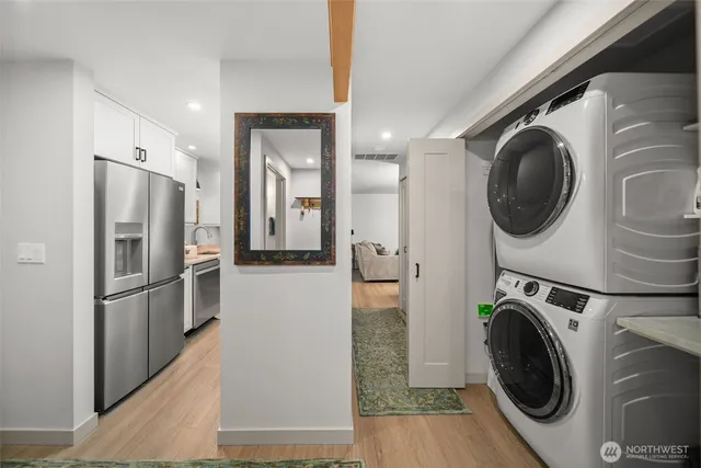 a view of a kitchen with washer and dryer