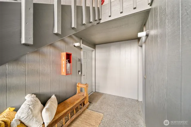 a view of a swimming pool with outdoor seating