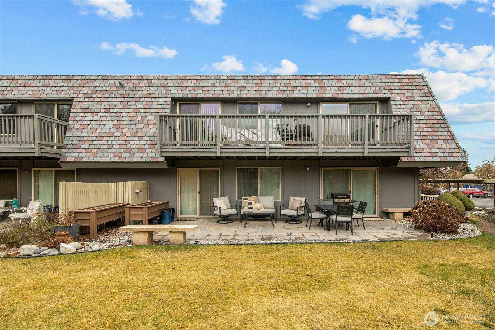 1535 Castlerock Avenue, Unit 26 Wenatchee, WA 98801 - Photo 28 of 32 a view of a swimming pool with outdoor seating