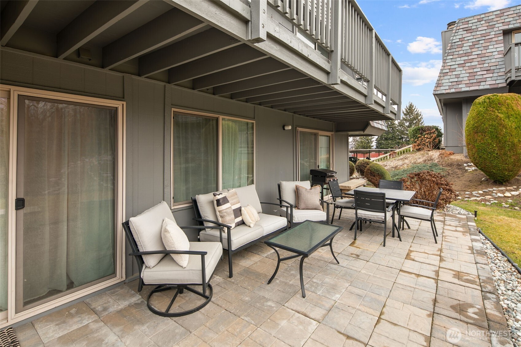 1535 Castlerock Avenue, Unit 26 Wenatchee, WA 98801 - Photo 30 of 32 a outdoor space with lots of furniture and a couch