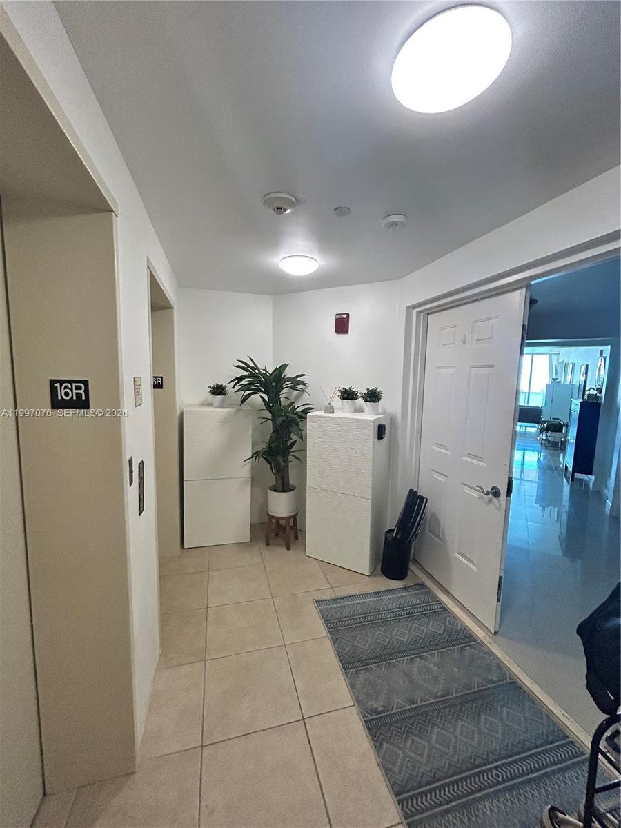 3330 Northeast 190th Street, Unit 1615 Aventura, FL 33180 - Photo 2 of 28 Private elevator lobby