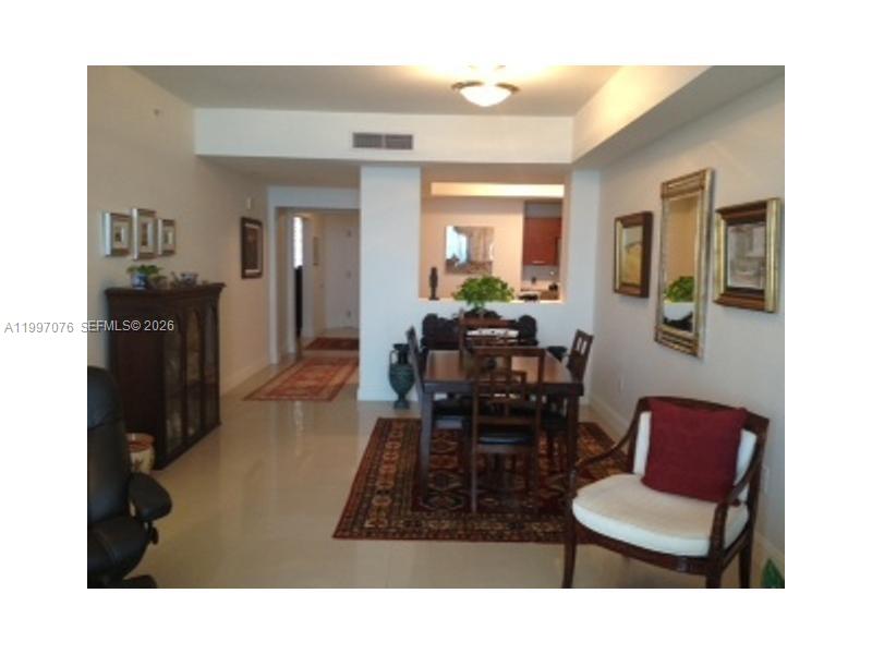 3330 Northeast 190th Street, Unit 1615 Aventura, FL 33180 - Photo 5 of 28 Dining room has pass through to kitchen