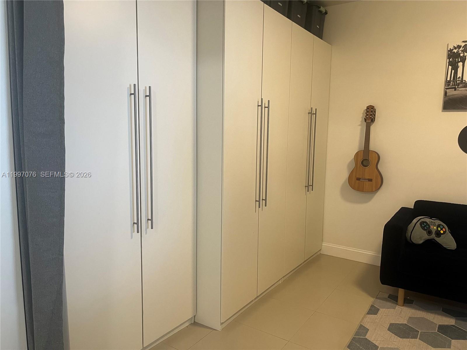 3330 Northeast 190th Street, Unit 1615 Aventura, FL 33180 - Photo 10 of 28 Third bedroom or den has built in closetry